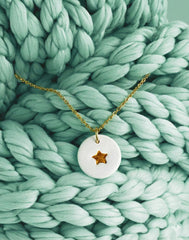 Colgante estrella blanca